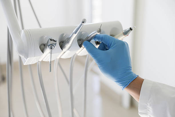 Professional Root Canal Treatment technician working in Valley City, ND